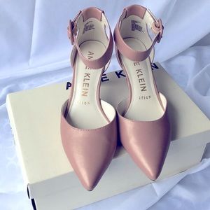 Ann Klein kitten heeled ankle strap pumps.